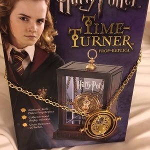 Time turner from Harry Potter with glass box